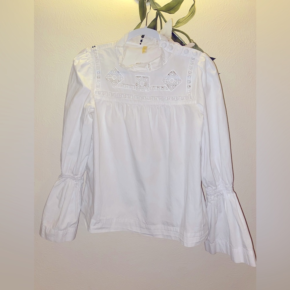 Free People white cotton blouse. Size M.